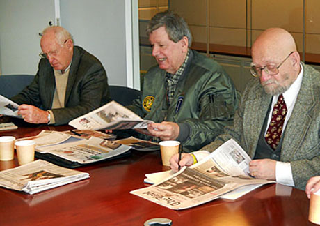 Three good judges, (l. to r.) John Bennett, Lou Priebe and Mike Rhea, started out their long day as print judges scanning base publications submitted in the Merit Awards program.