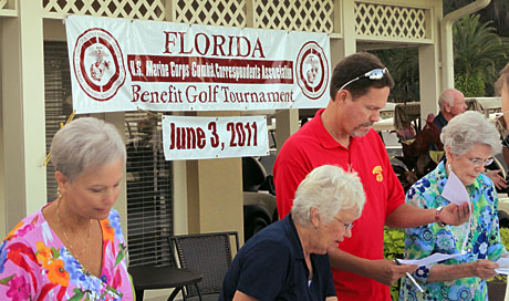 Worker Bees - (from l) Pat Paxton, Trudi Ehlbeck, Kevin Doll and Ann Carpenter ran the check-in desk for the tournament. They were kept busy as the tournament drew a record 120 entries.