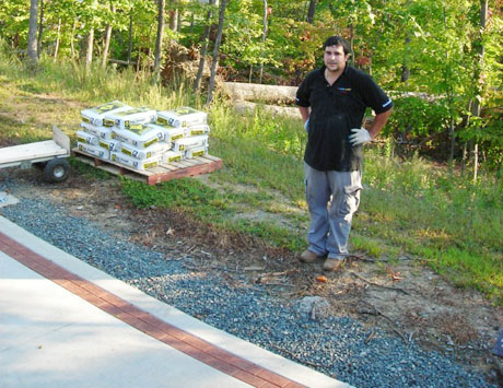 Robert of Gleeson Construction, Manassas, Va., stands on the site where he will begin digging/preparing the foundation for the Denig Memorial. Preparations for the Denig Memorial along Semper Fidelis Trail at the Marine Corps Heritage Center (National Museum of the Marine Corps) are about to begin. This is the location, just below the Chapel and near the Chesty Puller overlook.