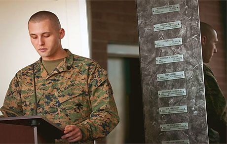 Staff Sgt. Joshua M. Souza, Basic Multimedia Reproduction Course instructor at the Defense Information School (DINFOS), reads his poem