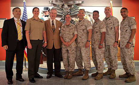 Members Were Present and Accounted For on June 1 as Al Eskalis (far right) and Brenda Varnadore (4th from l) were promoted to major and master sergeant respectively. USMCCCA members attending the ceremonies were (from l) Manny Pacheco, Ronna Weyland, Paxton, Varnadore, Col. Bryan Salas, Joe Espinosa, Sal Cardella and Eskalis.