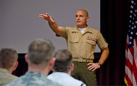 U.S. Marine Corps Master Sgt. Salvatore Cardella Jr. motivates the Department of Defense's newest broadcasters at the Basic Combat Correspondent Course Class 070-13 graduation ceremony on July 12, 2013, at the Defense Information School, Fort George G. Meade, Md. Cardella served as the guest speaker for the ceremony. (DoD photo by U.S. Air Force Staff Sgt.