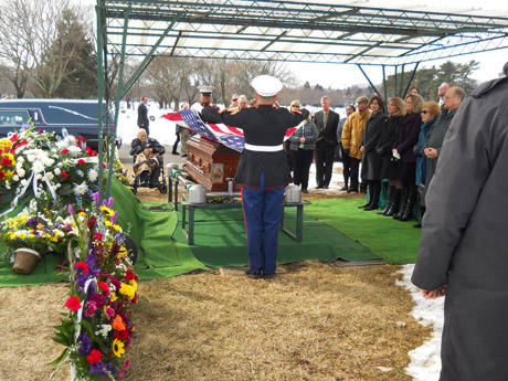 Flag folding ceremony at Cy O'Brien's grave site.