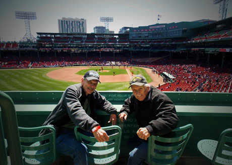 David and Don Knight atop the famous Green Monster seats at Fenway Park, Boston.