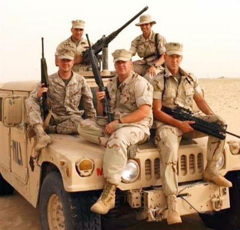 Warrior-Scribe-Shooter Lane Miley in the turret with 2d FSSG teammates (clockwise from his left) Madisol Cantu, Allan Grodovich, Jason Huffine and Rowdy Yeatts, circa 2003 in the Middle East, gearing-up for Operation Iraqi Freedom.