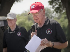 Tournament chair “Red” Carpenter welcomes golfers.