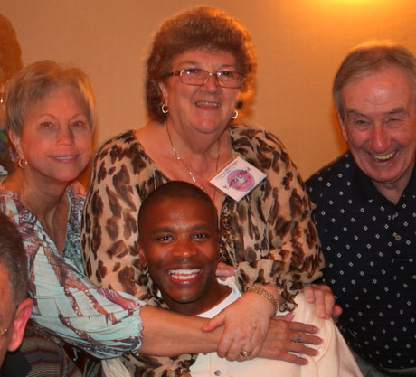 Congratulations to Ricoh Player who is our first Life Member in 2014! Ricoh, seated is shown love from Pat  Paxton, Yvette O'Neal and Jack Paxton at the conference in 2010.